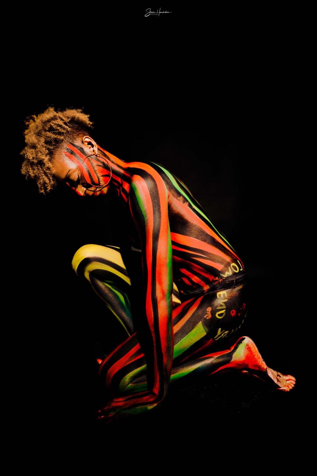 Ember — UV body art by Tina Cozart